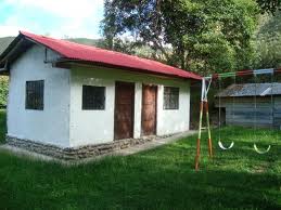 Terreno Comercial en Venta con Casa Sector Bulcay-Planeta Azul Gualaceo - Ecuador
